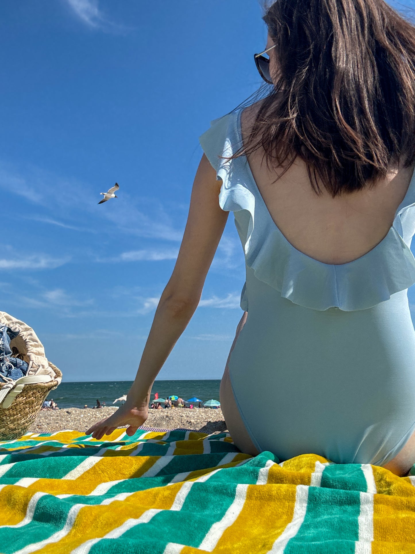 light blue ruffled one piece swimsuit