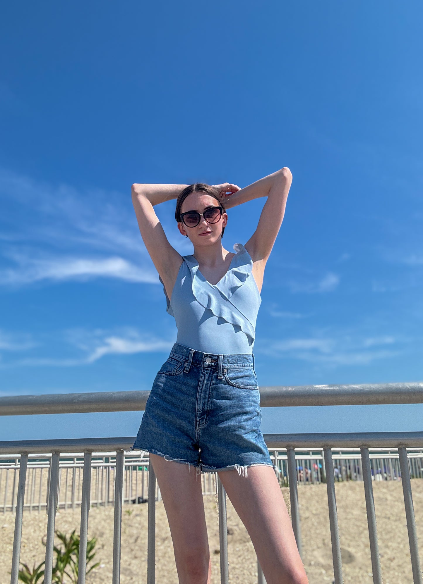 light blue ruffled one piece swimsuit